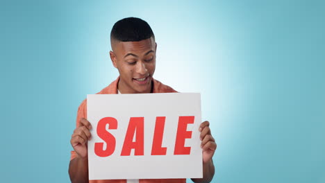 sale, discount and banner by excited man in studio