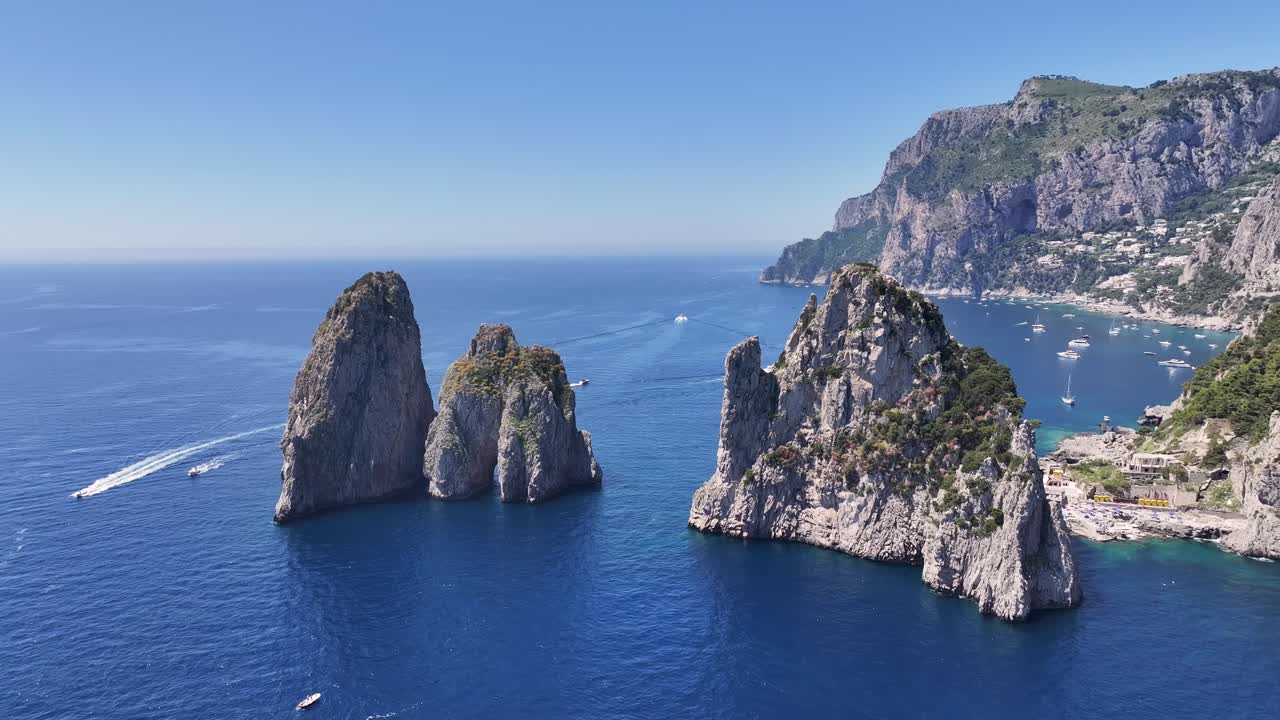 Faraglioni At Capri In Naples Italy. Island Landscape. Tourism Landmark. Faraglioni At Capri In Naples Italy. Bay Of Naples Skyline. Cultural Heritage Coastal. Paradise Capri Island.