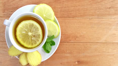 lemon tea with sliced ginger and herb