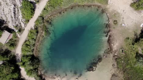 Aerial-drone-video,-over-Lake-Cetina-with-few-people