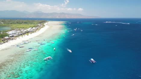 gili meno, indonesia - aerial panoramic view of turquoise beach and boats