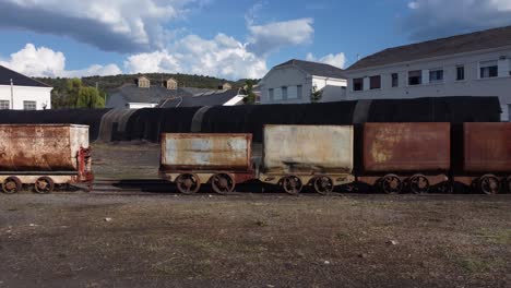 travelling of ancient wagons used to carry black coal in the mine of pozo julia, fabero