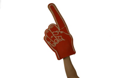 Supporter-holds-a-foam-hand-up-in-air