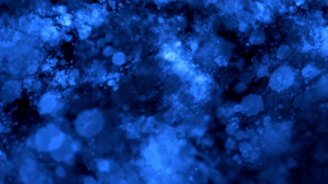 Chaotic blue motion graphics scene, where various-sized particles form a constantly moving and morphing ice storm type of view with changing spotlight type of highlights