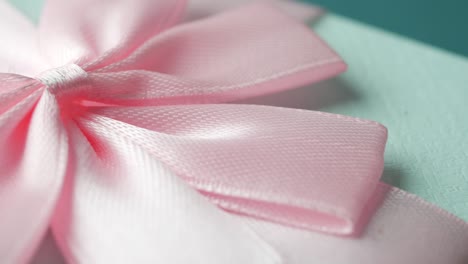 pink ribbon gift bow close-up