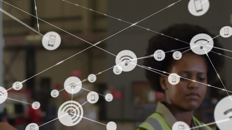 Animation of connected phone and wifi icons over african american woman and man working in warehouse