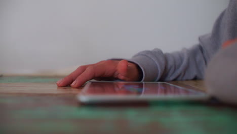 Closeup-Shot-Of-A-Woman-Using-A-Tablet