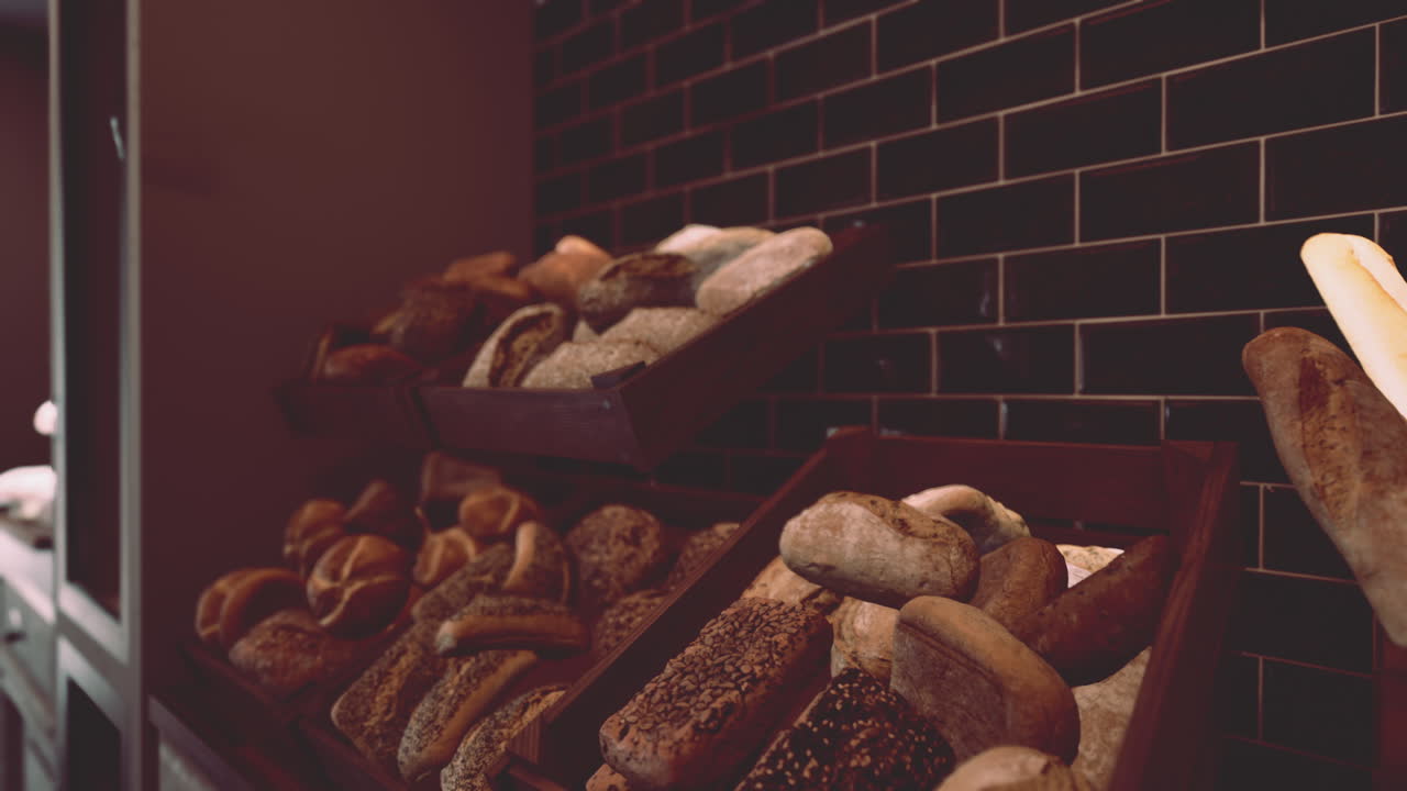 Assorted types of bread displayed on store shelves