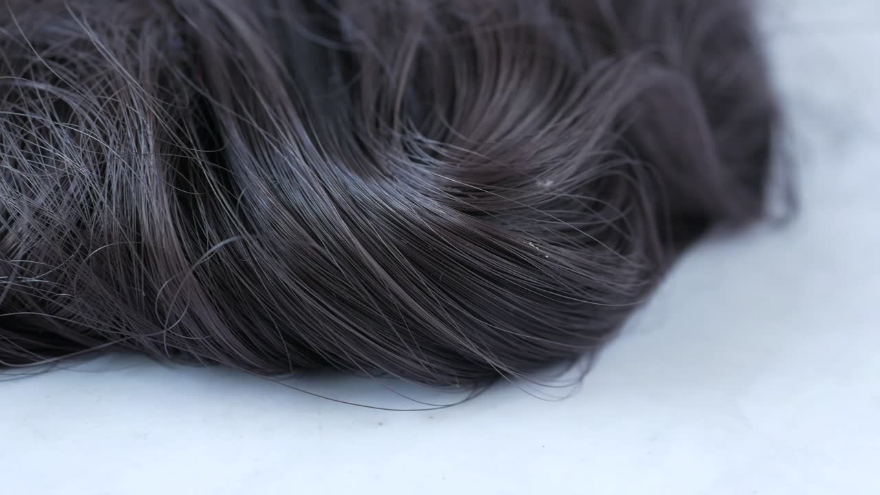 검은 머리카락의 클로즈업 뷰