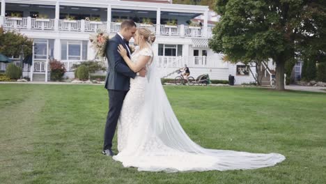 couple pose in front in bustling city