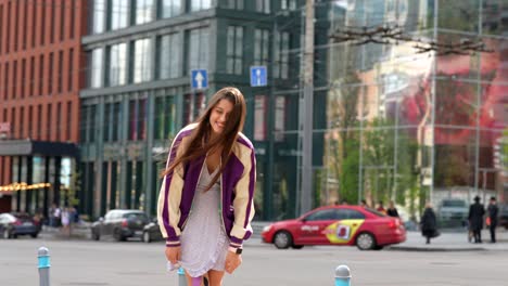 young woman smiling in city