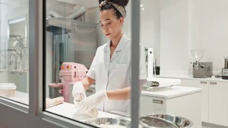 Woman,-baking-or-chef-baker-in-bakery-on-kitchen