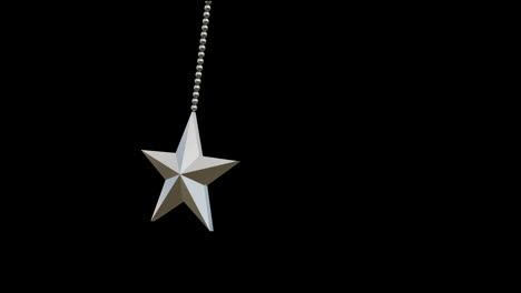 animation of star christmas bauble decoration over black background