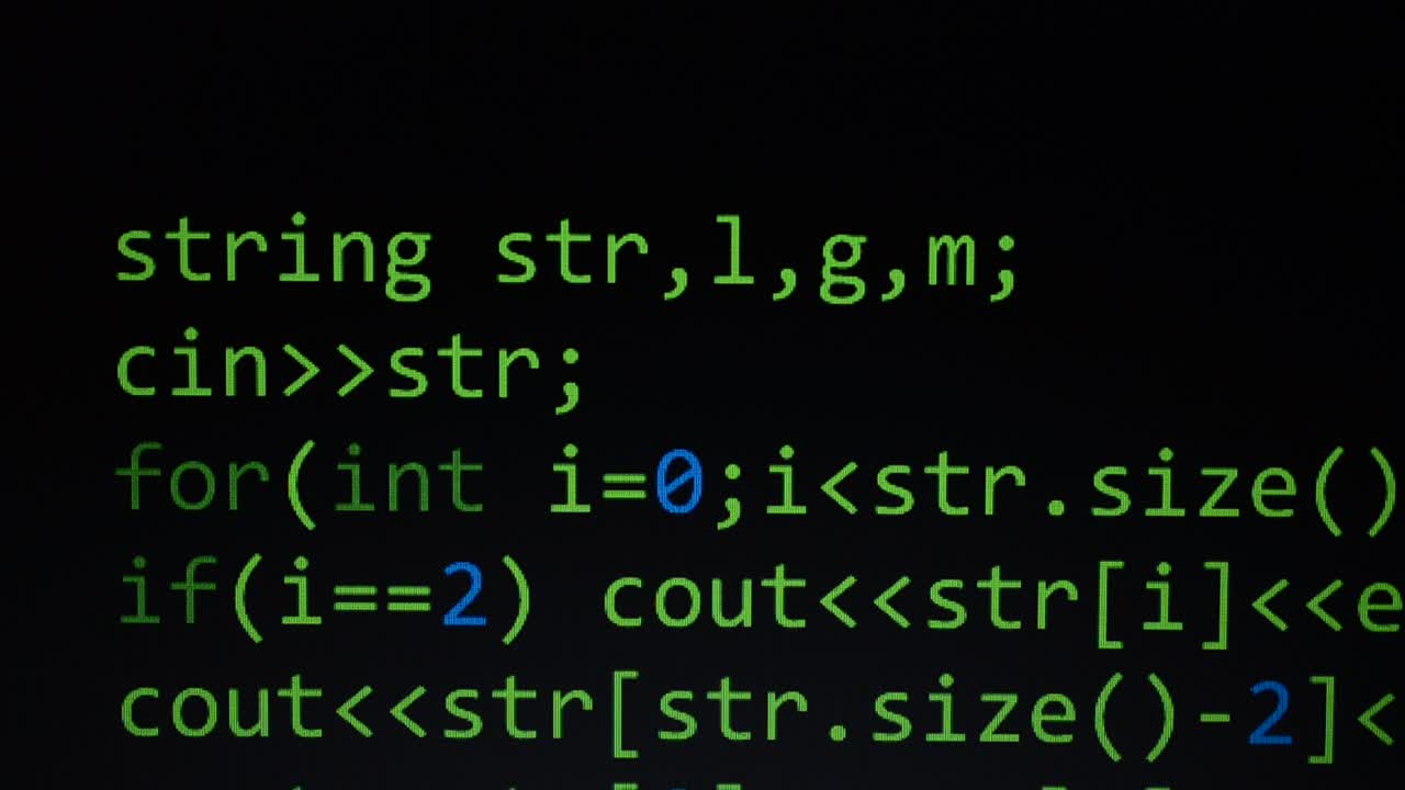 Source code on the monitor screen. Source code