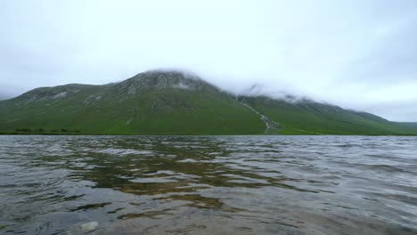 mountain water flows under mountainous region