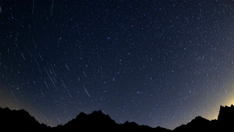star trails over mountains