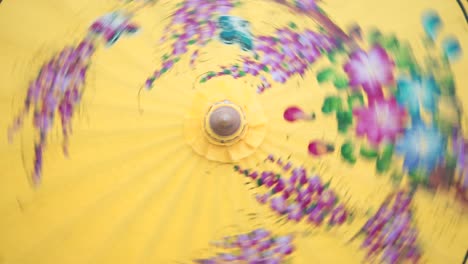 yellow floral umbrella top view