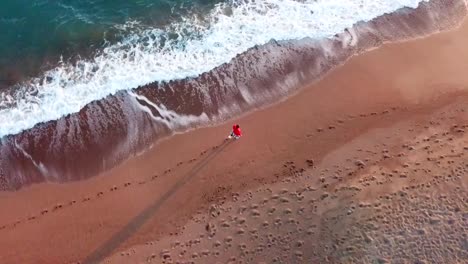 sunny beach sand footsteps  waves