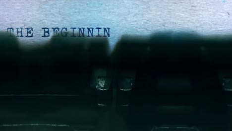 the beginning word closeup being typing and centered on a sheet of paper on old vintage typewriter