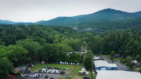 tilt up and push in with a drone over the trees in the adirondack mountains