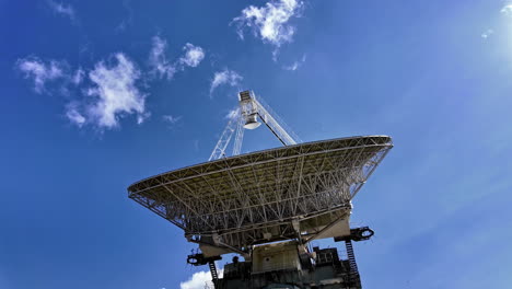 large satellite dish under blue sky