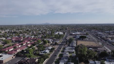 Flying-Above-Asphalt-Street-In-Mesa,-Arizona,-USA