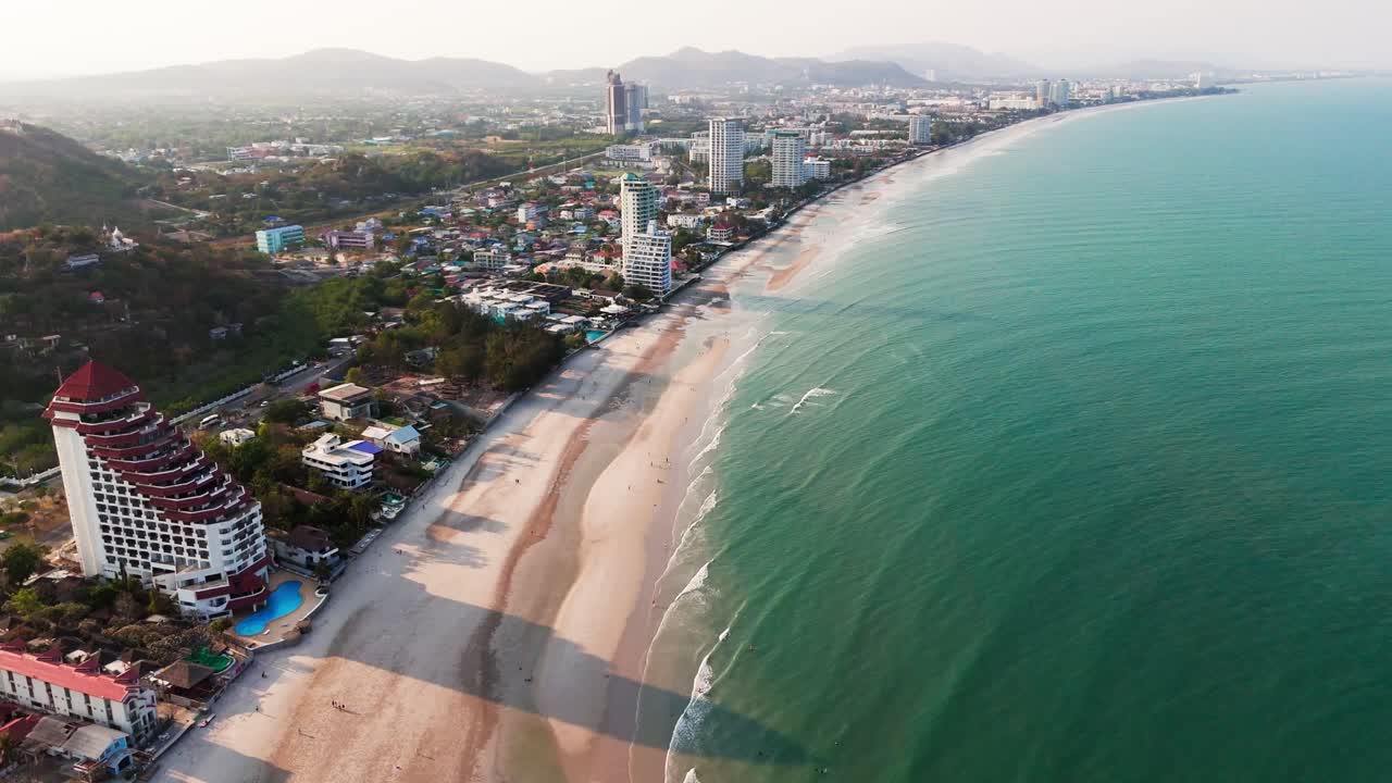 White sand beach town in Hua Hin Thailand, Aerial drone fly travel destination, establishing