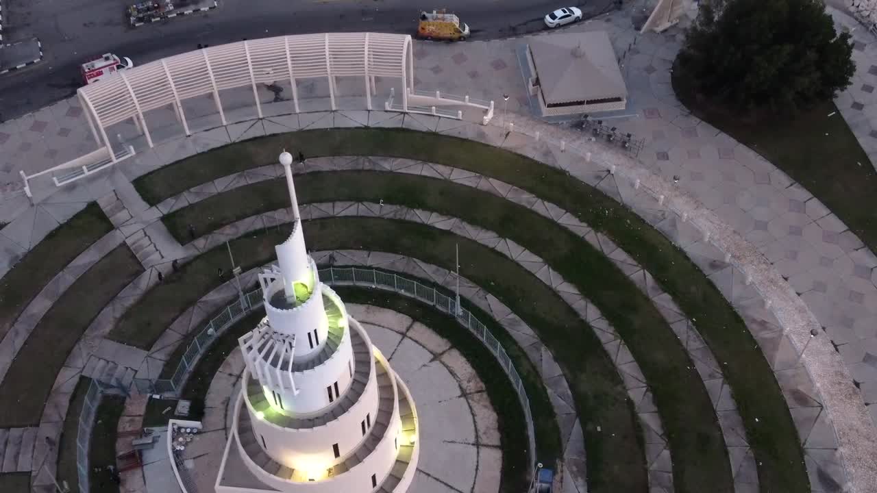 White shining tower of Murjan island in Dammam, aerial fly over view