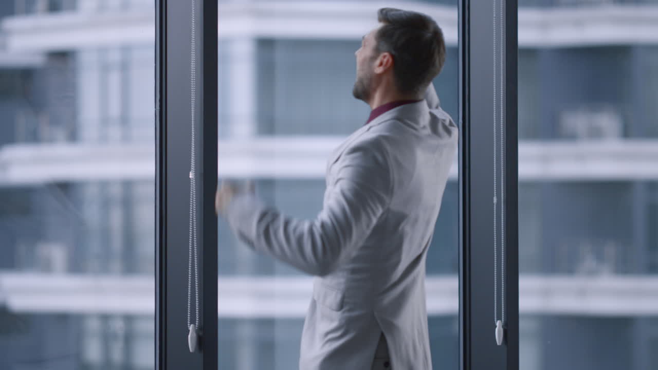 Overjoyed man celebrating business victory