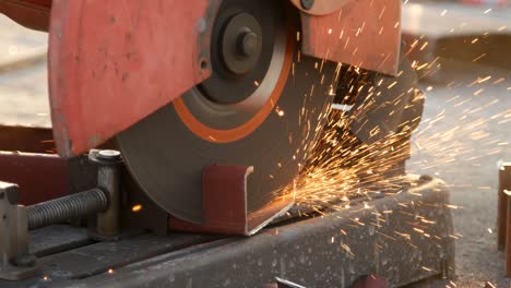 cutting steel channel (steel c chanel) with grinder. sparks while grinding iron