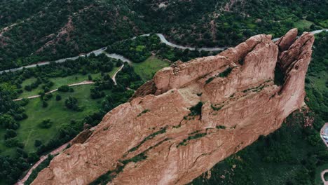 aerial view rising over garden of the gods and its unique rock formation