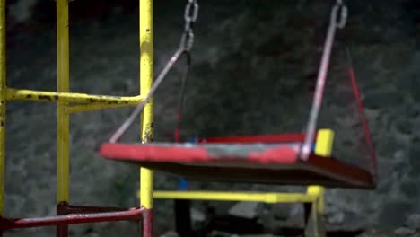 swing on playground at night