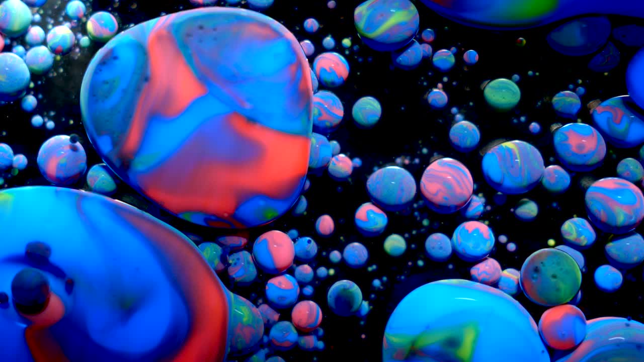 Slow Motion Bright Colors Bubbles Oil Beautiful Paint Universe Color Moving Multicolored Closeup. Acrylic Paint. Fantastic Surface. Abstract Colorful Paint Metamorphosis Structure Colorful Bubbles