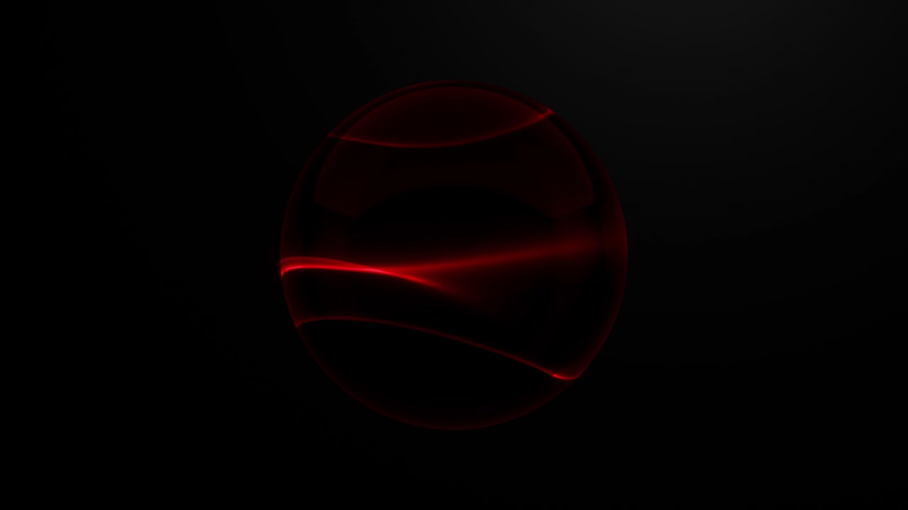Abstract red light waves inside a transparent glass sphere