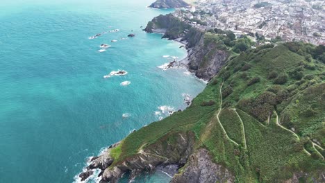 drone flight over the torrs cliffs and rugged coastline – ilfracombe, devon, uk