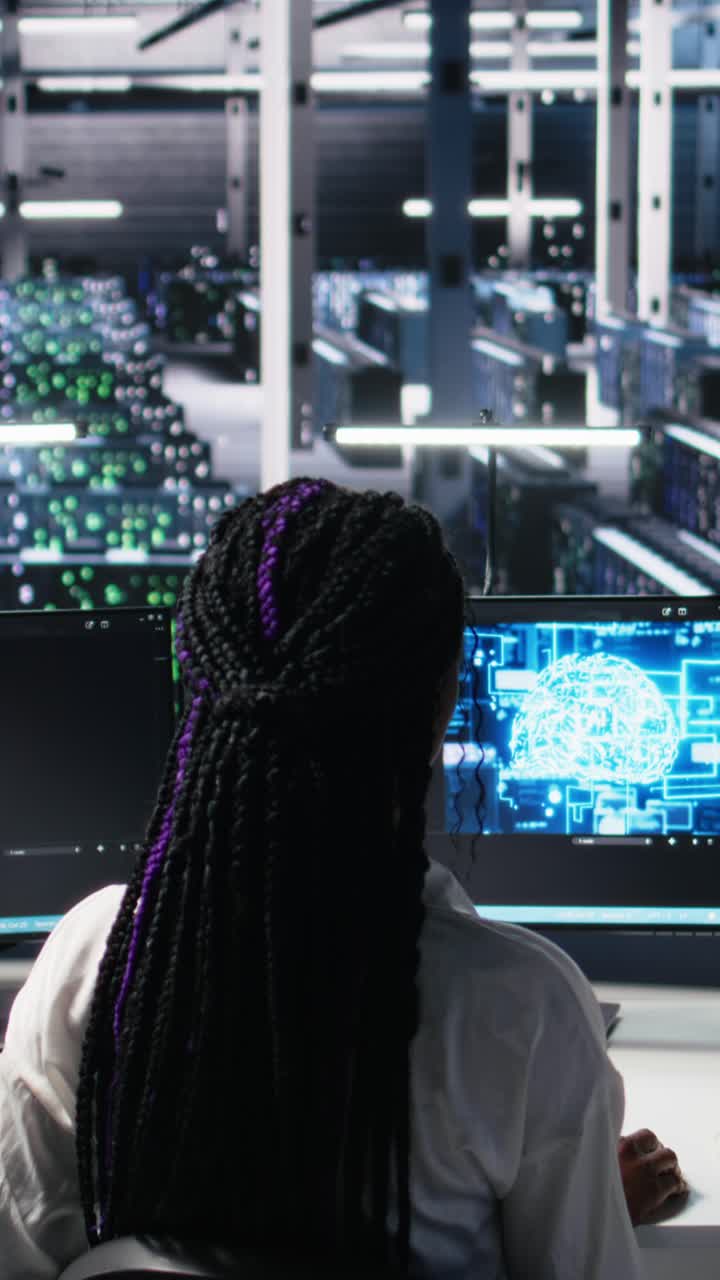 Vertical video Technicians in data center review AI diagnostics, analyzing neural networks