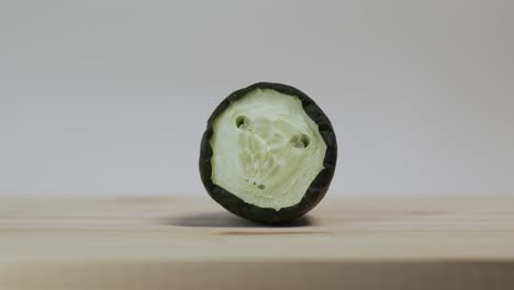 dried cucumber on wooden cutting board