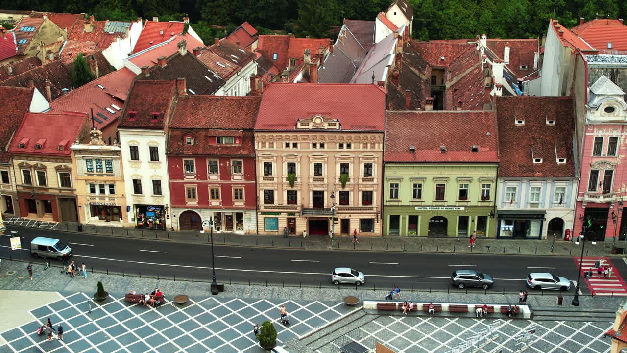 Aerial drone view of Brasov, Romania. Old city centre with street and moving cars
