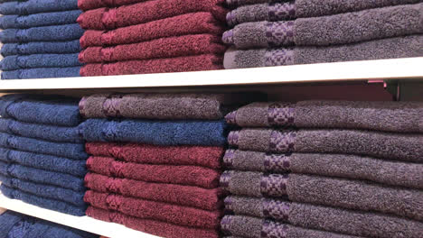 colorful-towel-on-shelf-in-retail-store