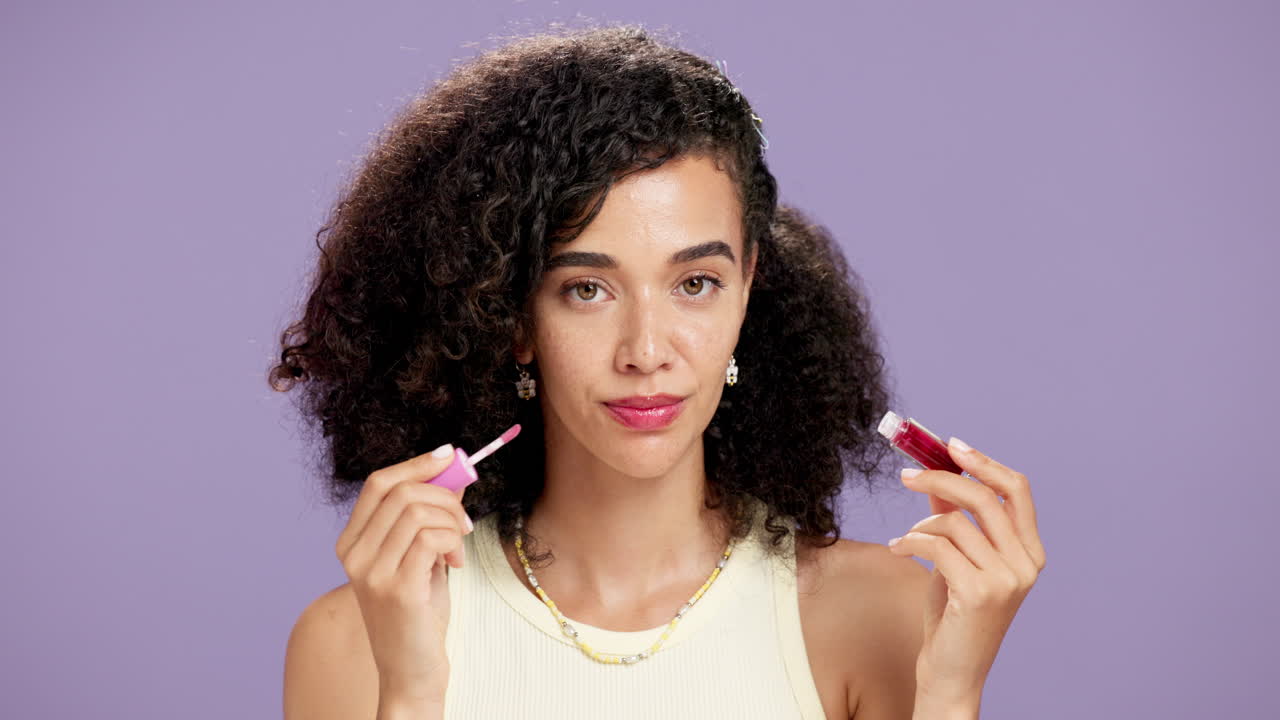 Woman Applying Lip Gloss