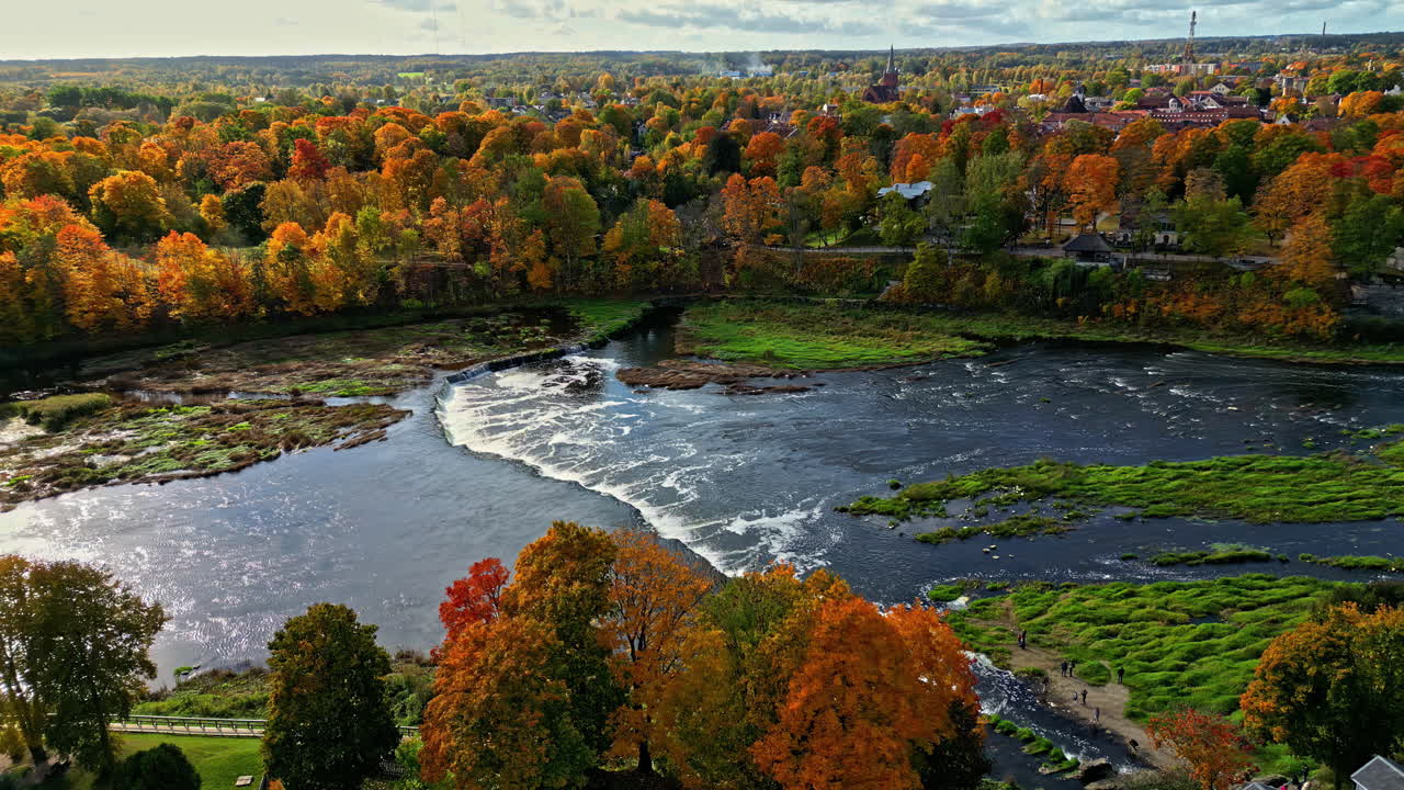 Venta river Latvia waterfall Ventas Rumba autumn fall season colours forest canopy leaves