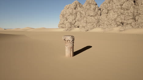 una sola columna se alza en un vasto paisaje desértico