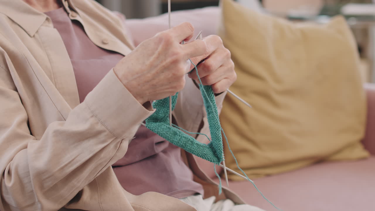 Senior woman knitting