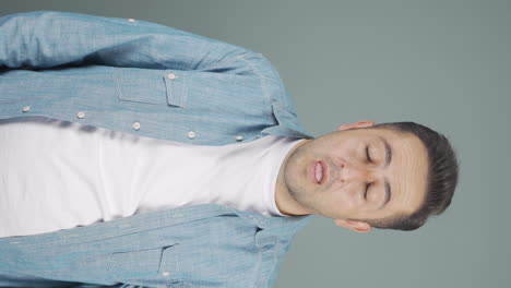 Vertical-video-of-The-sneezing-man.-Patient.