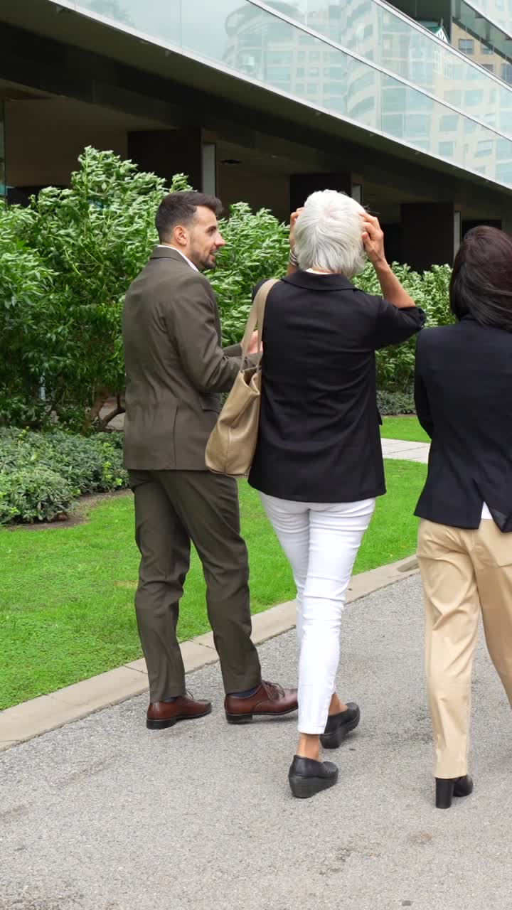 People Walking in a Business District