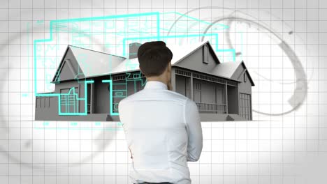 arquitecto diseñando casa en interfaz tecnológica