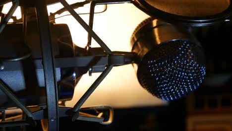 slow right panning shot of studio microphone close up