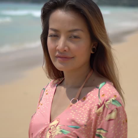 stylish lady on sandy beach