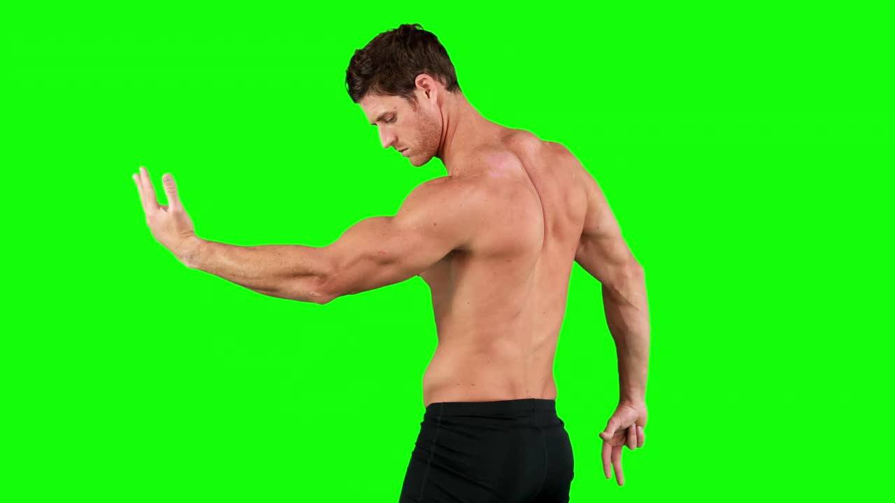 Muscular man flexing his muscles