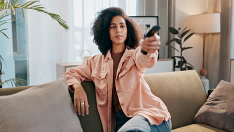 excited woman taking a selfie at home